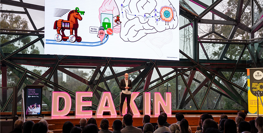 Person presenting on stage