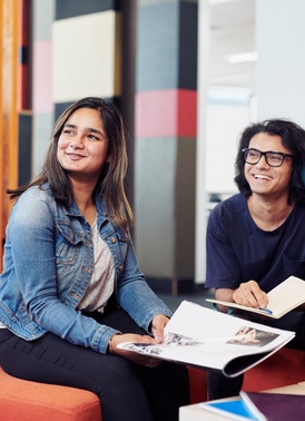 Students sitting in library
