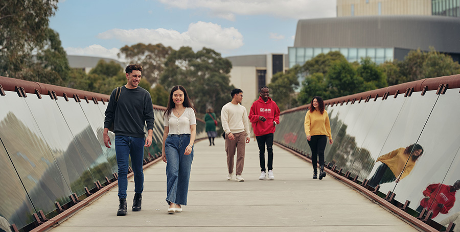 Deakin students on the bridge at Melbourne Burwood Campus.