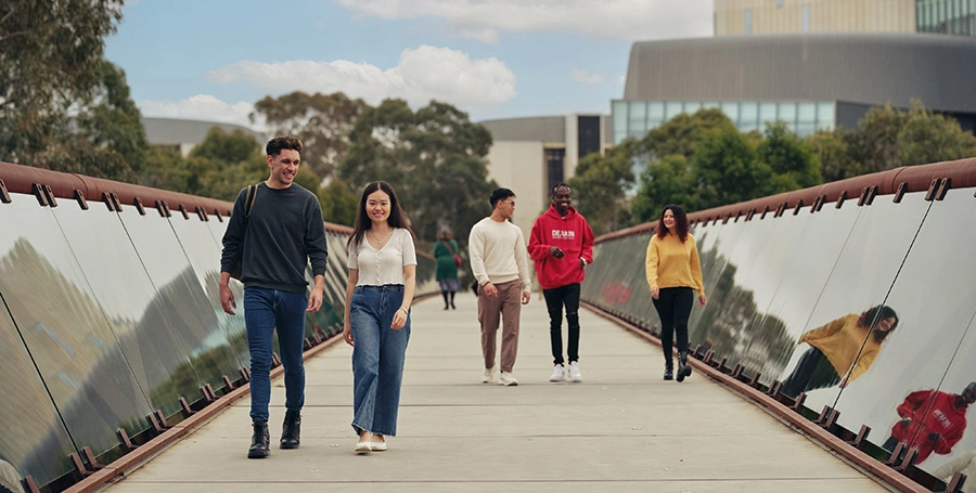 Deakin students on the bridge at Melbourne Burwood Campus.