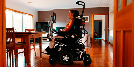 Man on wheelchair powered by AI and Technology.