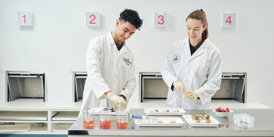 Two students in a lab