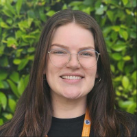 A headshot of Belinda Wriedt smiling at the camera.