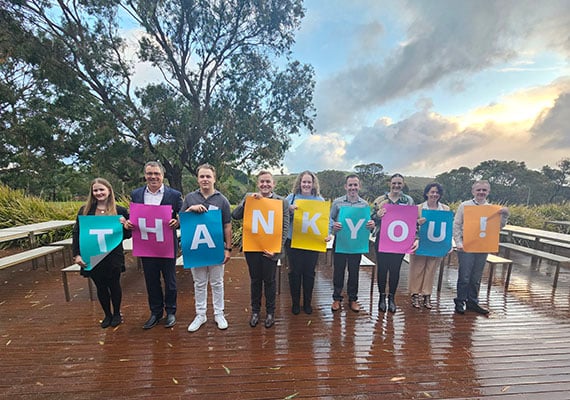 Deakin Warrnambool students holding a thank you sign