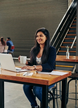 student sitting in cafe 
