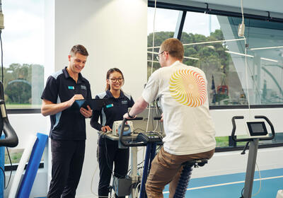 Students conducting test on a cyclist