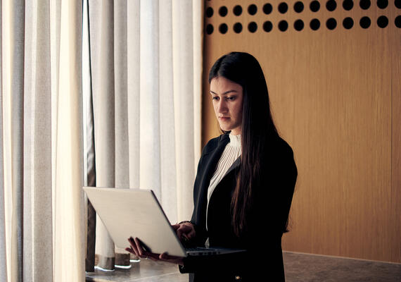 Student with laptop.