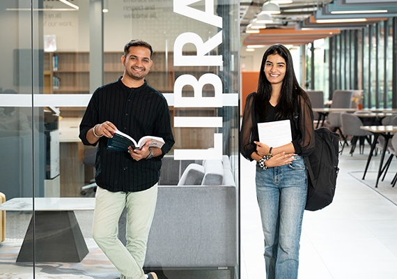 Two students at the library at Deakin GIFT City