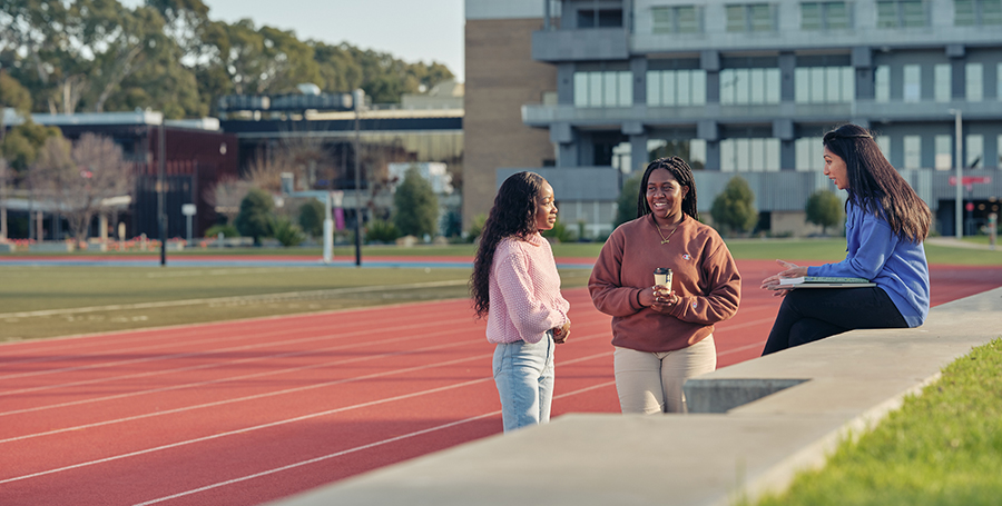 Deakin students at the sports track on the Geelong Waurn Ponds Campus.