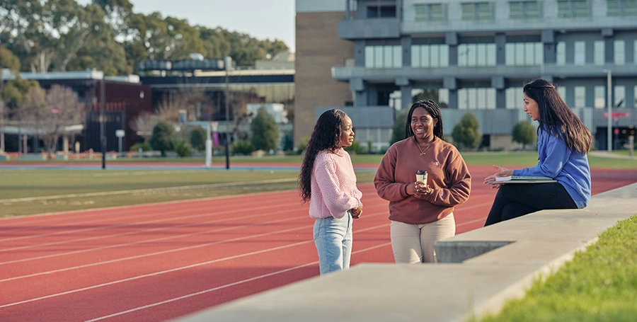 Deakin students at the sports track on the Geelong Waurn Ponds Campus.