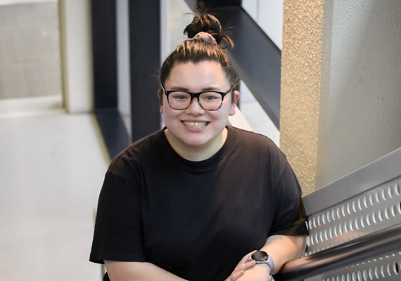 Deakin student Jasmine Lo smiling on campus.