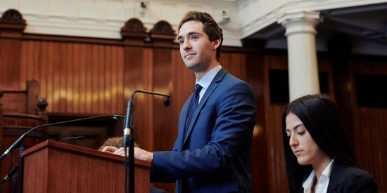 Deakin student arguing a case in moot court