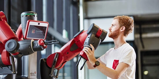 Student interacts with Baxter the robot