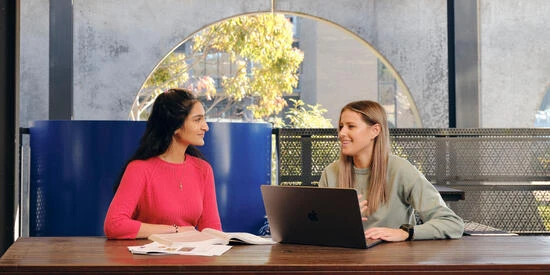 Two Deakin students having a discussion