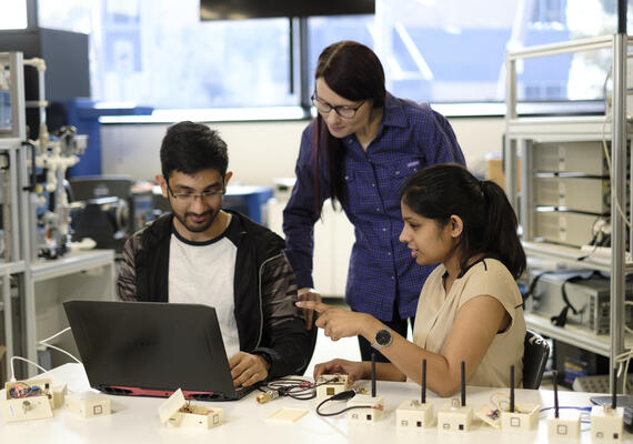 A group of Electrical and Electronic Engineering students learning.