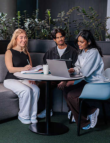 Three Deakin students study on the Burwood campus