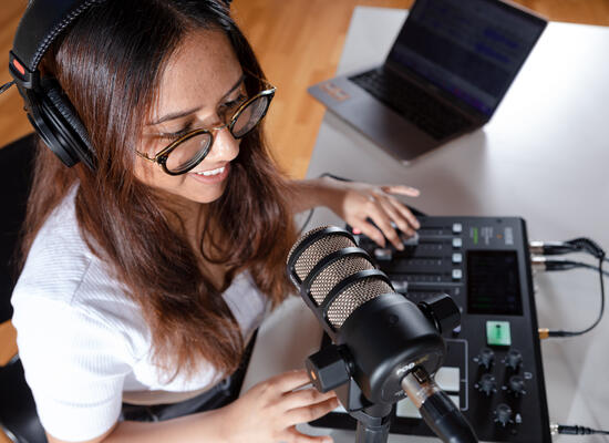 female student eith audio visual euipment 
