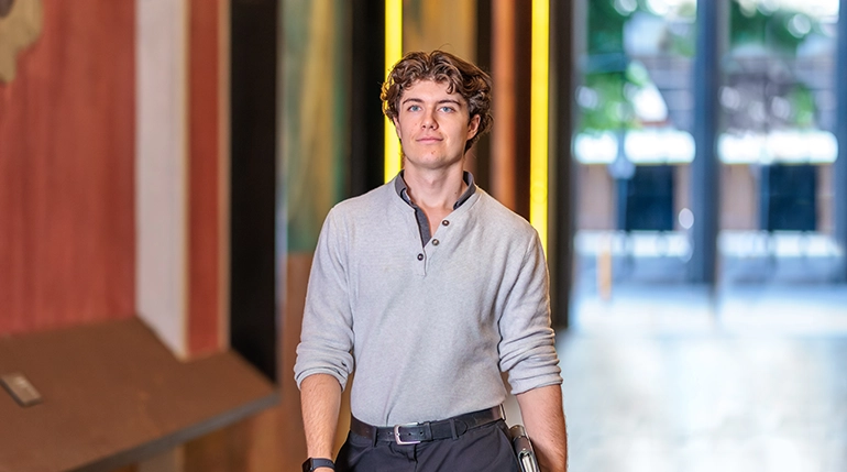 A student engage in business activities at Deakin Downtown