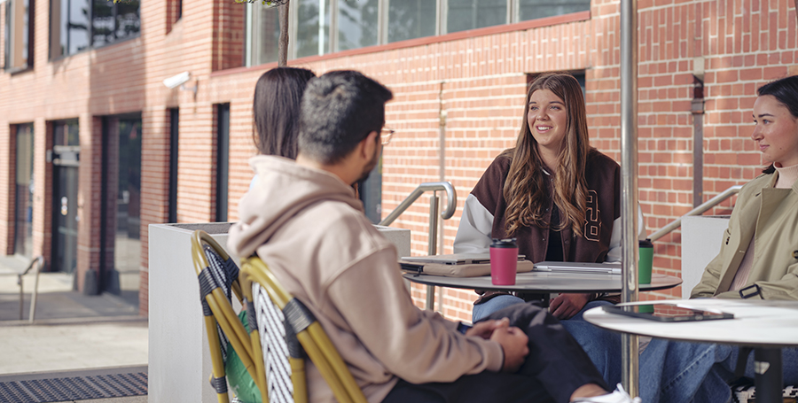 Students at a cafe having coffee