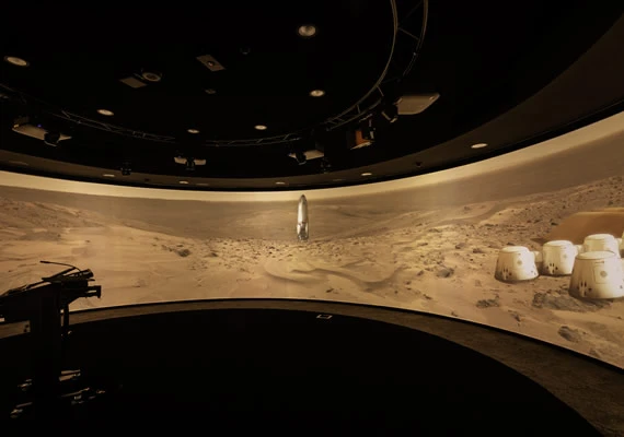 Inside the 360 facility showing a space rocket and planet surface