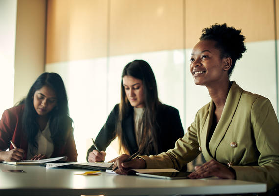 Students from Deakin business courses participate in a corporate meeting.