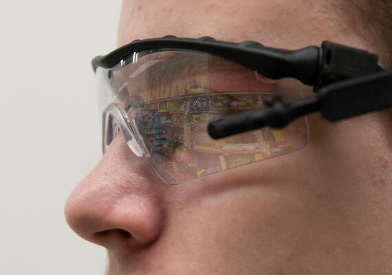 Image of a student wearing an eye tracking device.