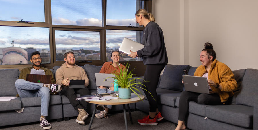 Students relax in shared living at Geelong Waterfront Campus.