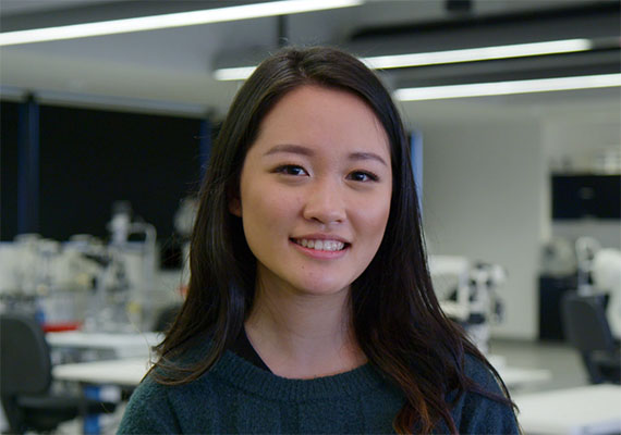 A Deakin optometry student smiles.