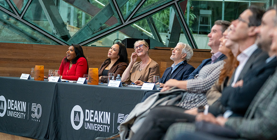 Panel of judges watching presentation