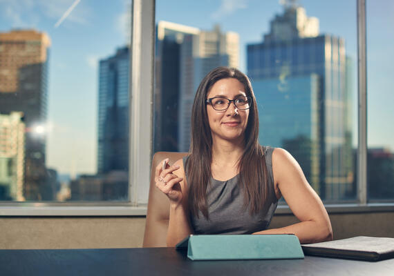 A Deakin student sitting at a desk