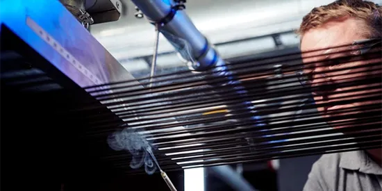 24877_550x275_carbon.webp A Deakin researcher with carbon fibre machine