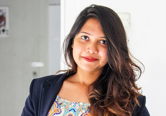 Deakin nursing student shaluni smiles on campus.