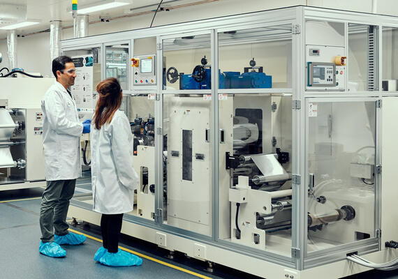 Two scientists in specialised lab