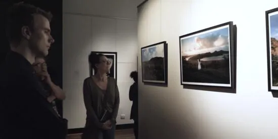 Deakin students looking at art in a gallery.