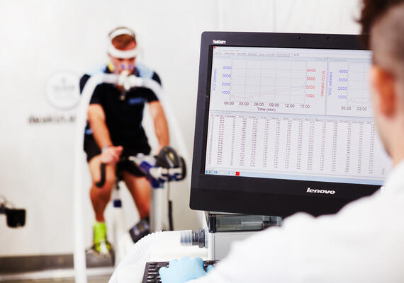 Deakin student on an exercise bike at the Waurn Ponds Campus.