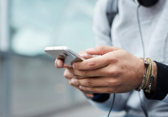 A man browsing on his mobile phone.