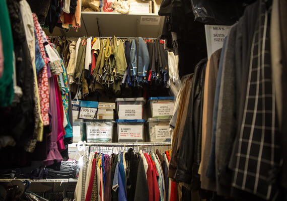 A closet full of clothing.