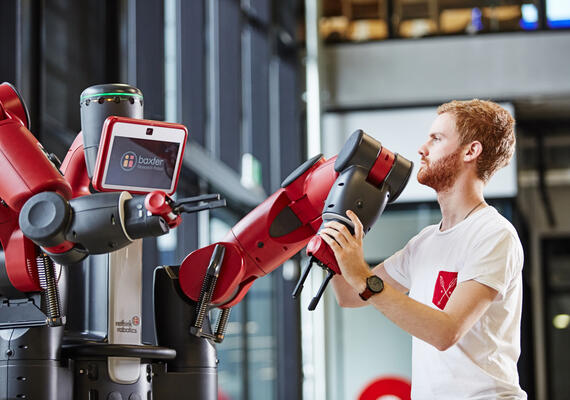 Student interacts with Baxter the robot