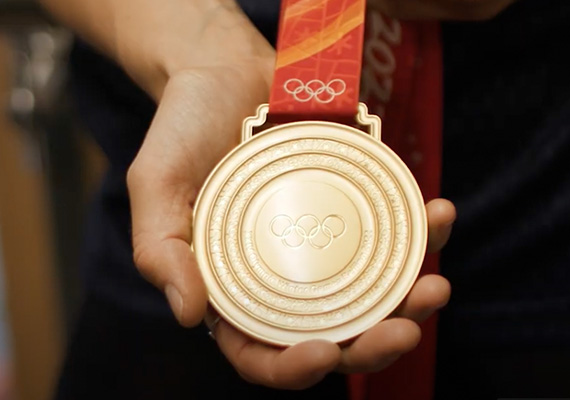 A close up on an Olympic Gold Medal 