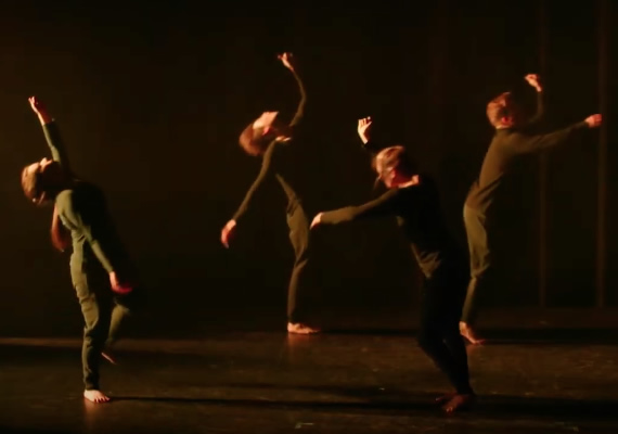 Students wearing black and performing in black box theatre at Deakin.