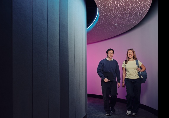 Students walking down a hallway