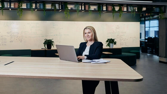 A Deakin Master of Education student works on a laptop.