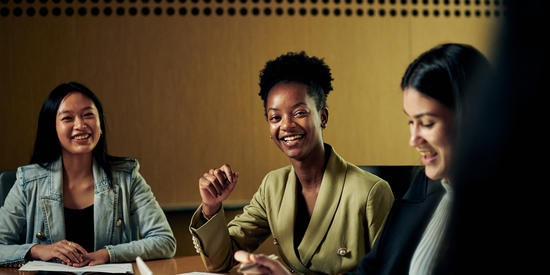 Group of Deakin marketing and psychology students in a meeting on campus. 