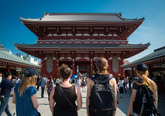 Deakin students standing in front of a temple in Japan during a study abroad program.