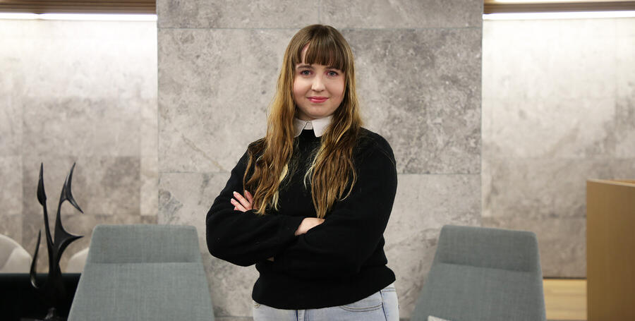 Researcher Kira Hughes standing at Deakin Downtown.
