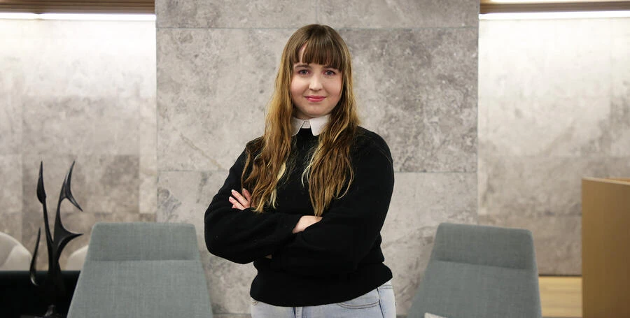 Researcher Kira Hughes standing at Deakin Downtown.