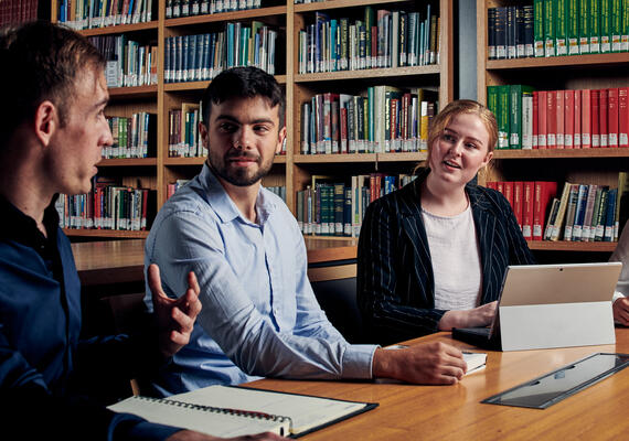 A Deakin law student consulting with a client.