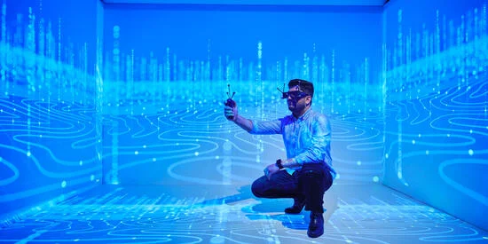 A researcher with a VR headset.