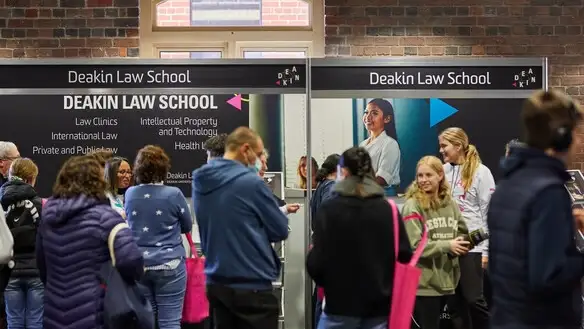 Deakin staff and students talking to future students at the Waterfront campus open day.