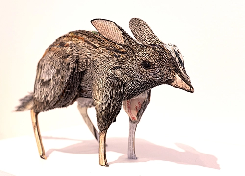 Kat Parker, Discarded, ink and watercolour on Australia Through Time pages, UV resin, MDF, boxboard and glue and layered linocut prints, 19.5 x 40 x 11.15cm, Winner of the 2026 Deakin University Contemporary Small Sculpture Award supported by Michael and Emily Tong. Image © and courtesy of the artist. Photo by Fiona Hamilton.